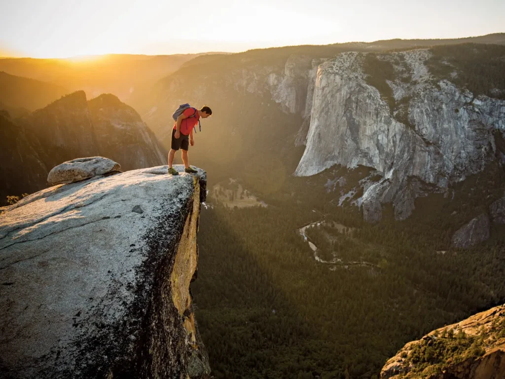 Alex Honnold in in mountain scene from movie solo