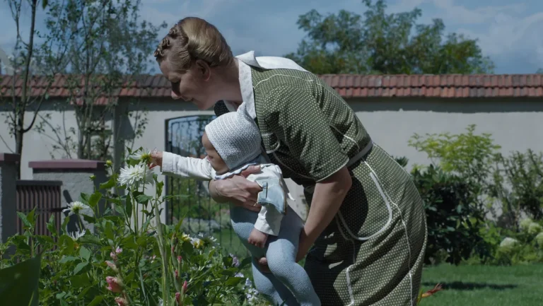 The Zone of Interest movie scene mother holding his child